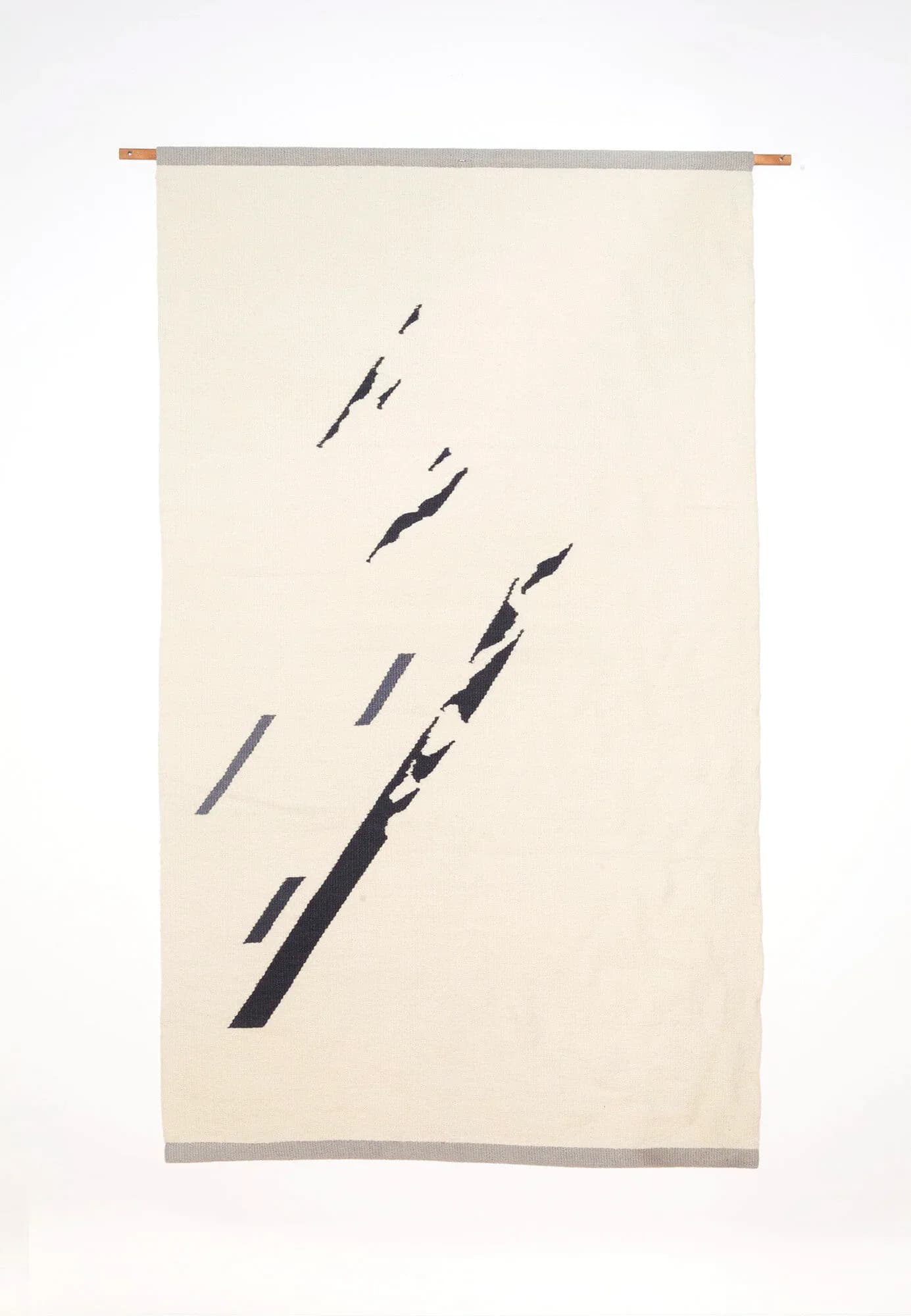 Woven wall hanging with cream ground and bold dark navy stacked horizontal bands with small red accents