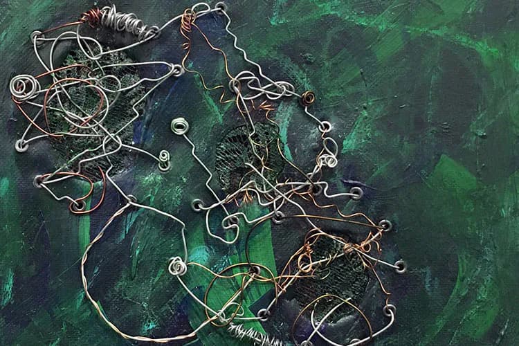 Abstract mixed-media composition with tangled metallic wire, twine, and organic forms against a deep green textured background.
