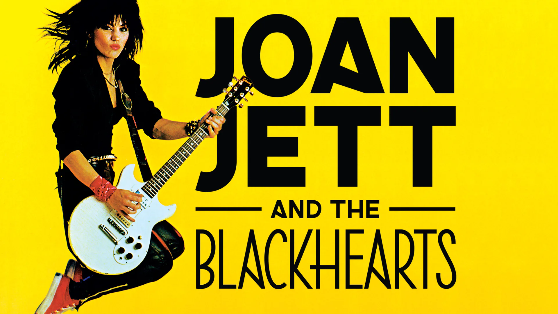 Joan Jett and the Blackhearts poster design on yellow background
