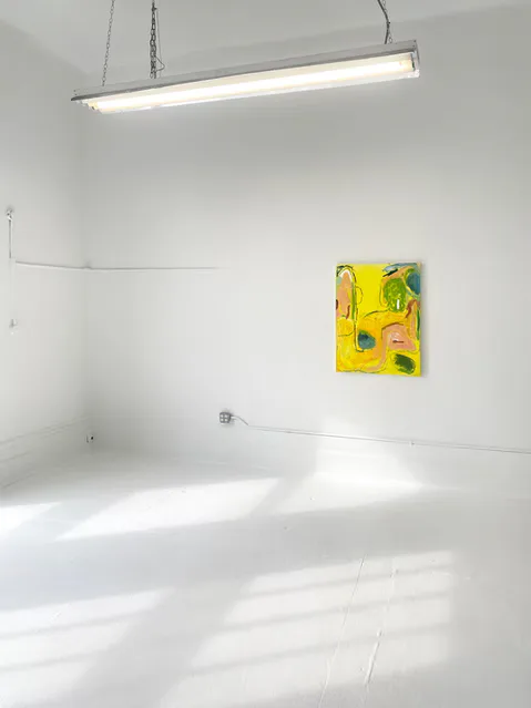 Minimalist white gallery room with suspended linear light fixture and small yellow abstract painting by Brandon Dean hanging on right wall.