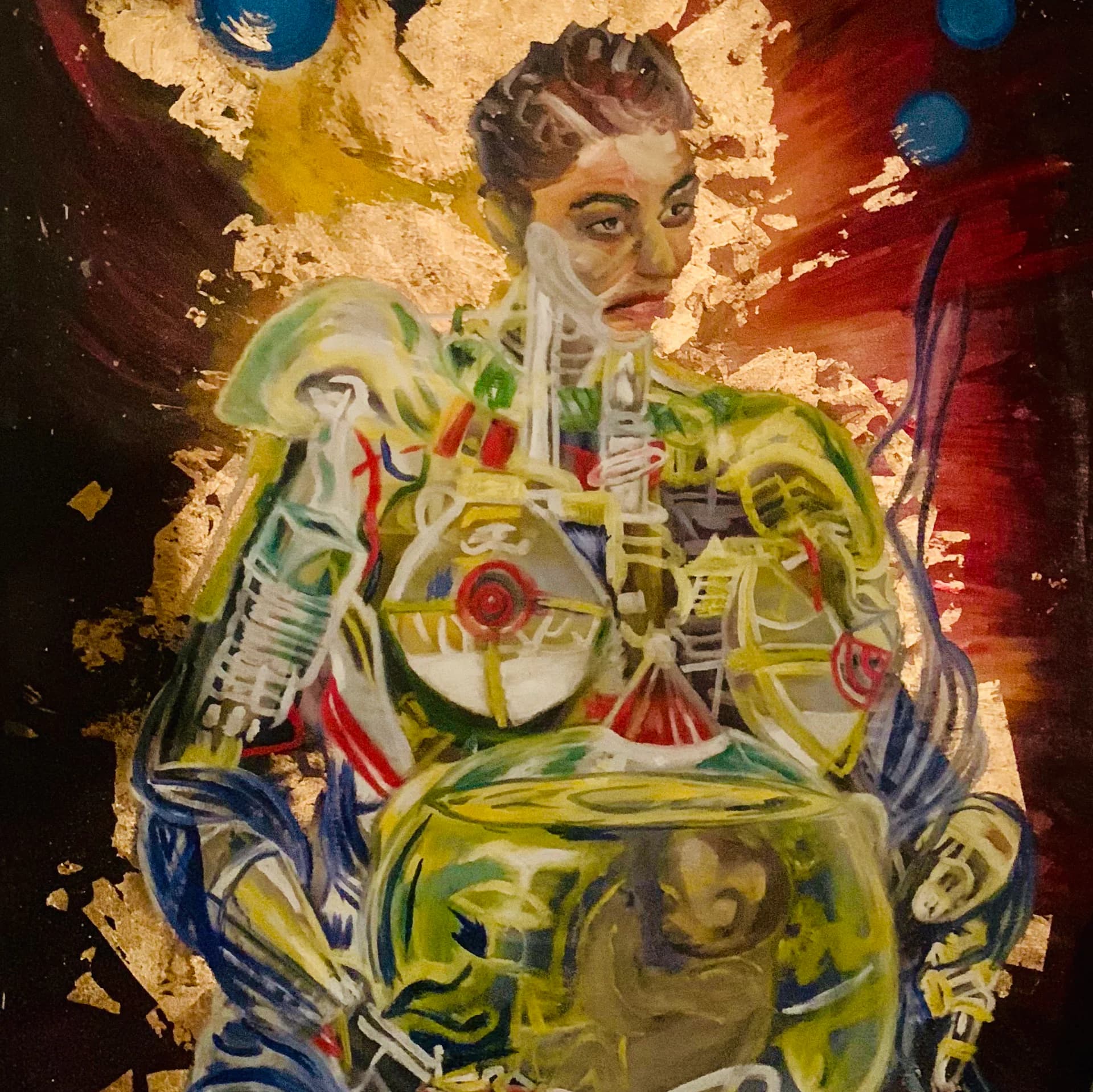 Figurative painting with gold leaf of a woman with exposed mechanical anatomy holding a child