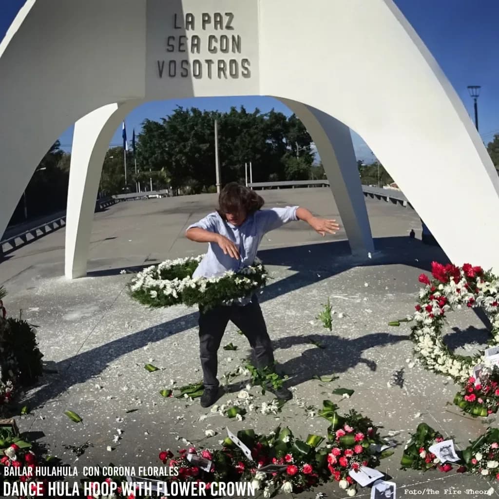 Performer hula-hooping with flower wreath crowns at peace monument