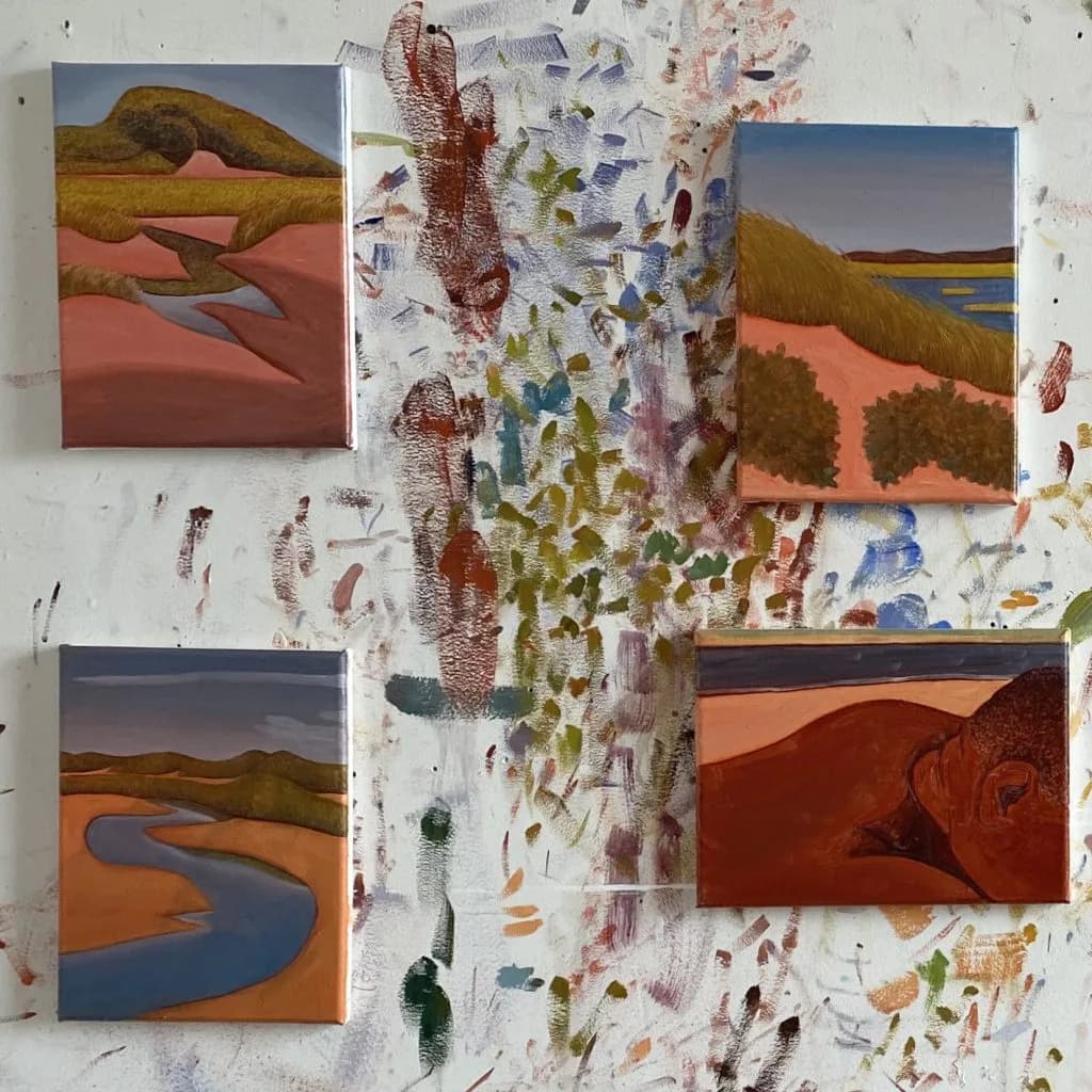 Five small paintings arranged on a white wall with paint splatters, depicting abstract landscapes with rolling hills, water, and warm earth tones in acrylic.