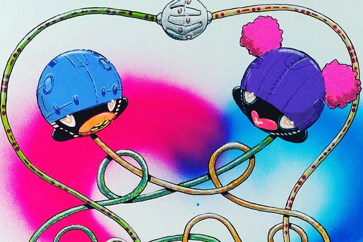 Two colorful cartoon characters with round helmets on a looping track, surrounded by vibrant magenta and blue gradient spray paint effects.
