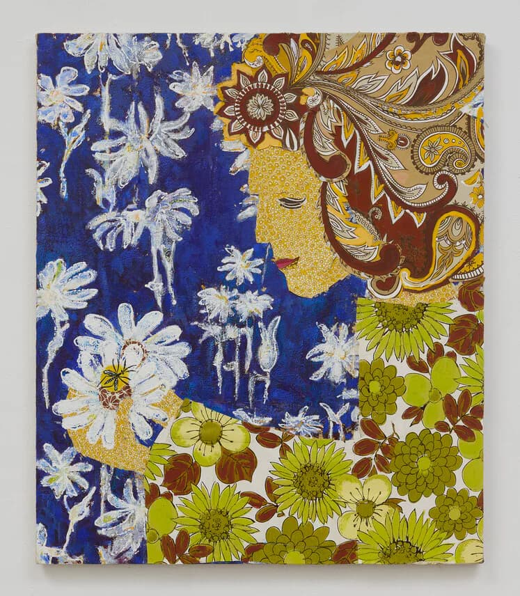 Mixed media collage portrait of a figure in profile surrounded by vivid blue floral patterns and paisley wallpaper