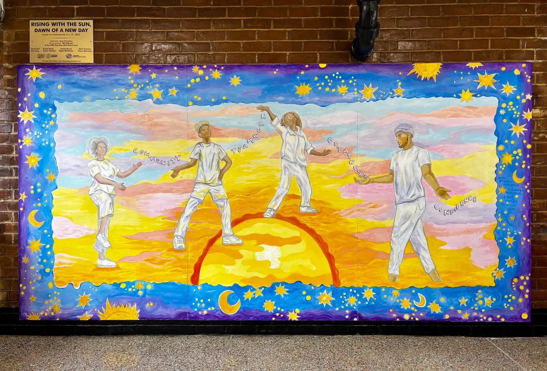 Mixed-media painting featuring five white-clad figures standing against a sunset landscape with yellow sun and pink sky, surrounded by blue border with stars and moons.