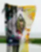 Blurred or low-resolution image showing fragmented textile or fabric forms in yellow and neutral tones.