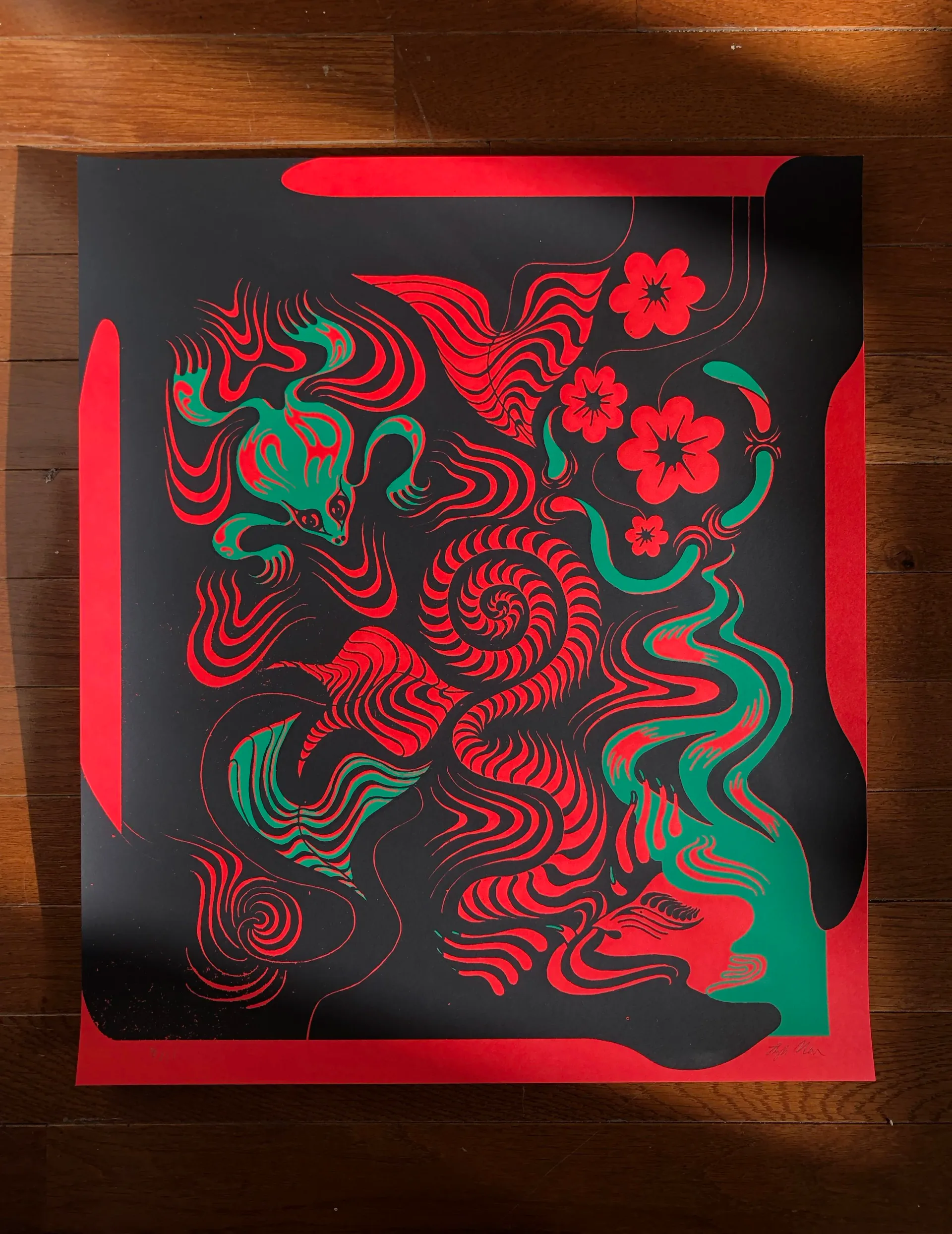 Screenprint of swirling fox-like creature with flowers in red and green on black background