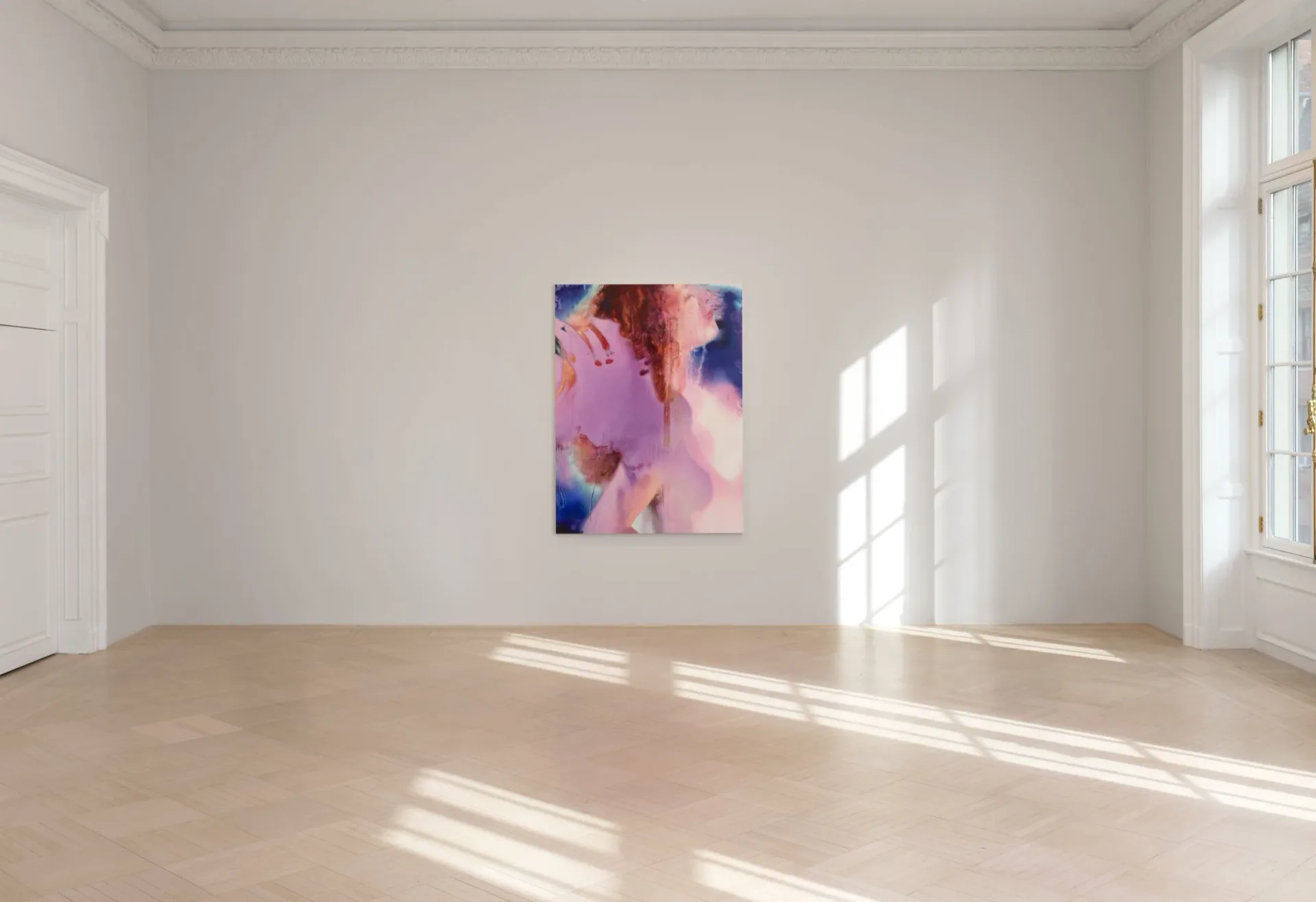 Bright gallery interior with pale wooden floors, white walls, and large windows casting geometric shadows; small abstract painting with pink and blue tones hangs on far wall.