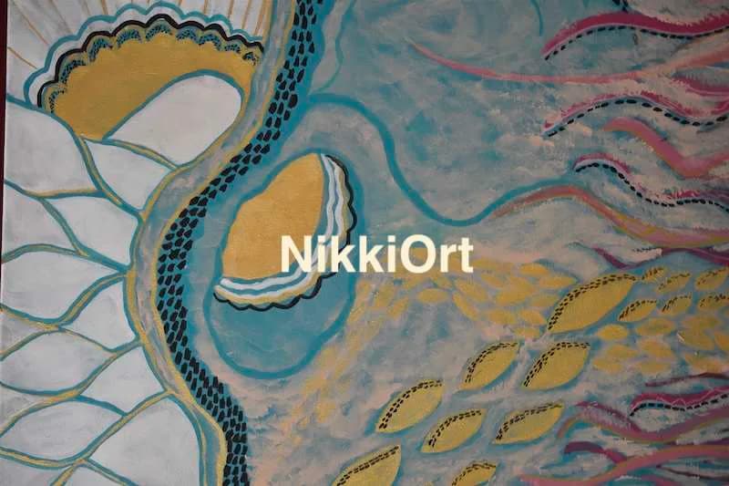 Textile or woven artwork in shades of blue with cream-colored connected square and organic shapes arranged in a repeating mosaic pattern.