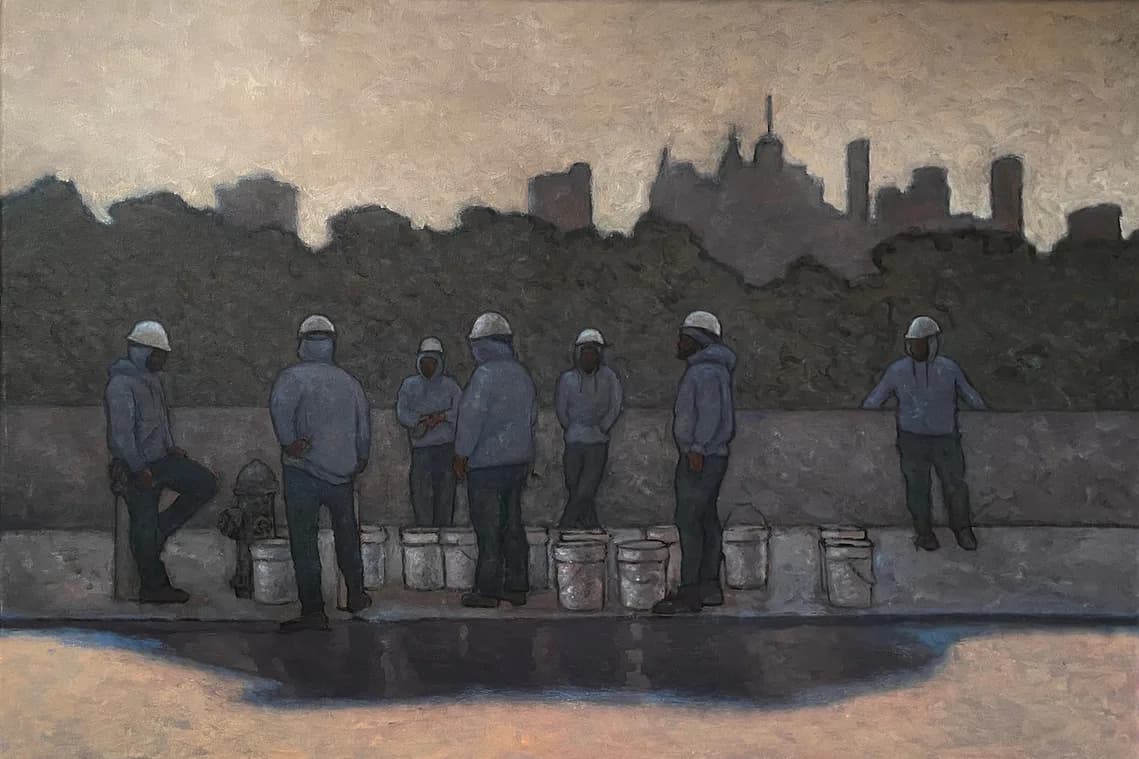 Construction workers in hard hats silhouetted against a city skyline at dusk