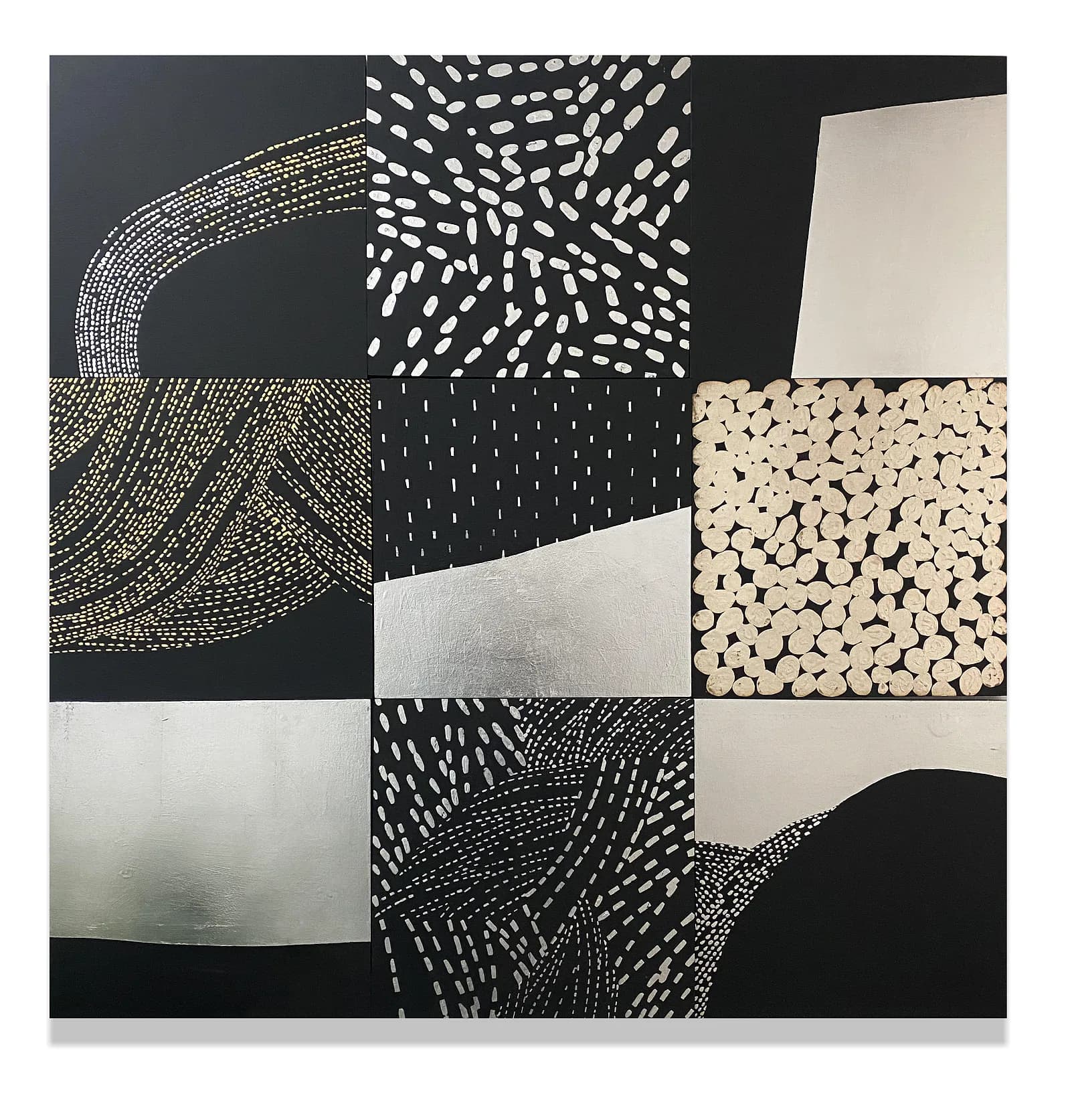 Large-scale black and white abstract painting with gold and silver leaf, dotted patterns and sweeping forms across nine panels