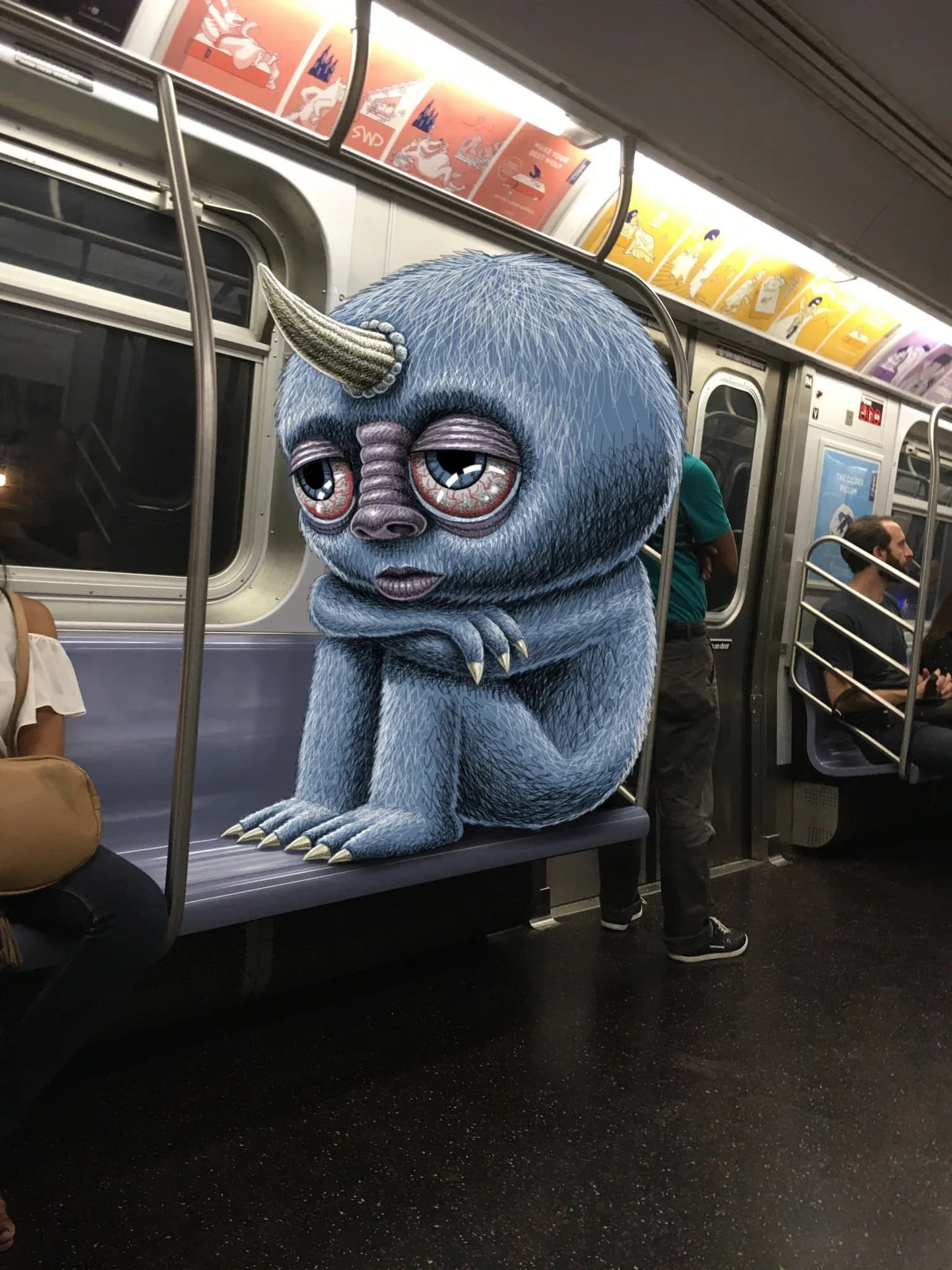 Melancholy blue horned monster creature sitting on NYC subway bench