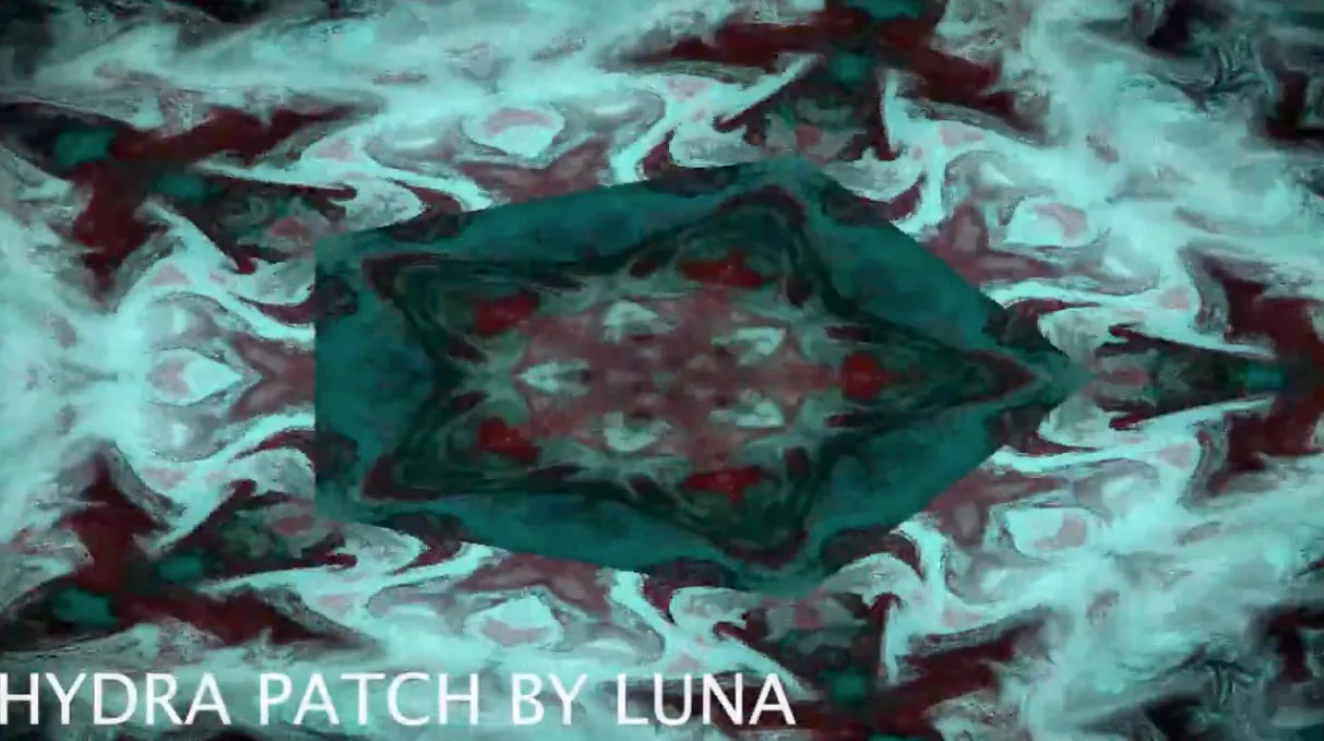 Hydra Patch by Luna – teal and crimson kaleidoscopic generative visual artwork