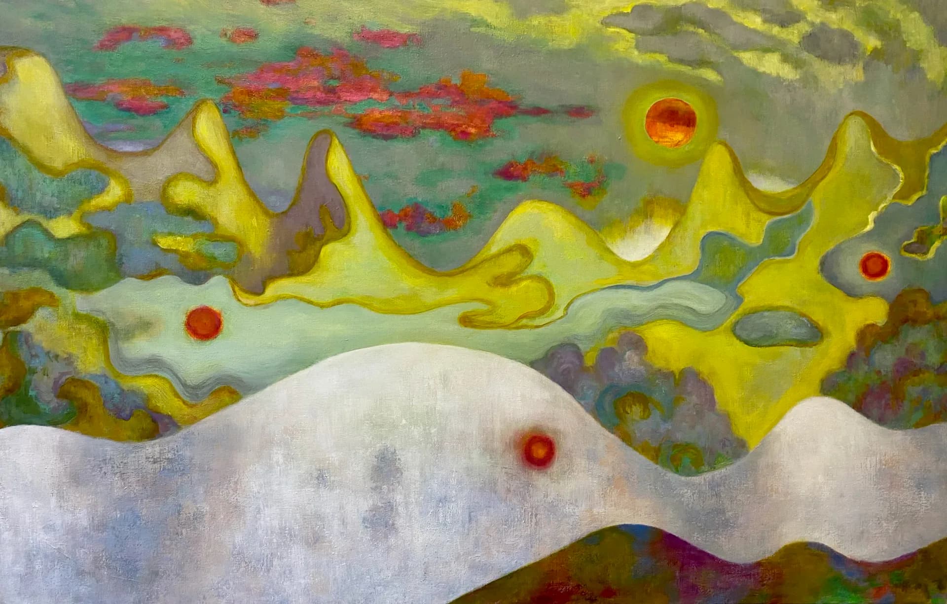 Fantastical landscape with red terrain and multiple celestial bodies including moons and suns in a teal sky with white cloud bank in foreground