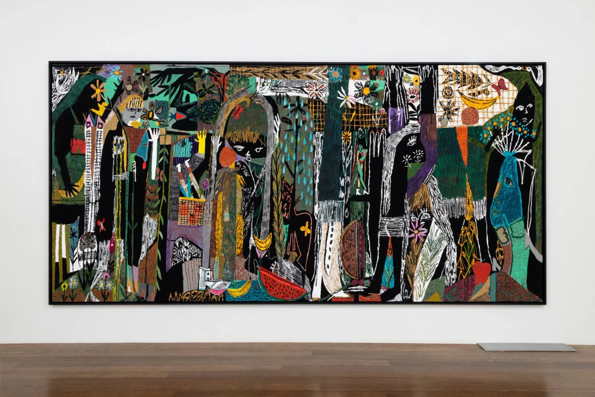 Abstract mixed-media collage with fragmented figures, vibrant colors, and layered compositions on dark background mounted on gallery wall.