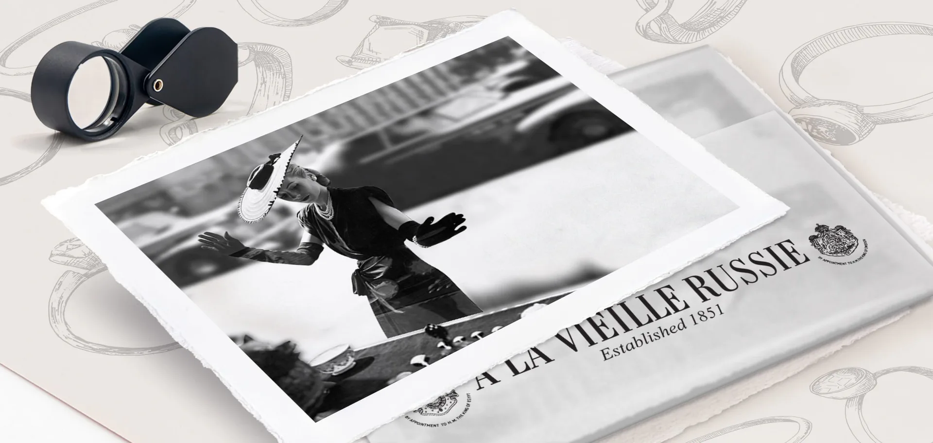 Black and white photograph of a person with a skateboard, printed on paper with French text "À LA VIEILLE RUSSIE" at bottom.