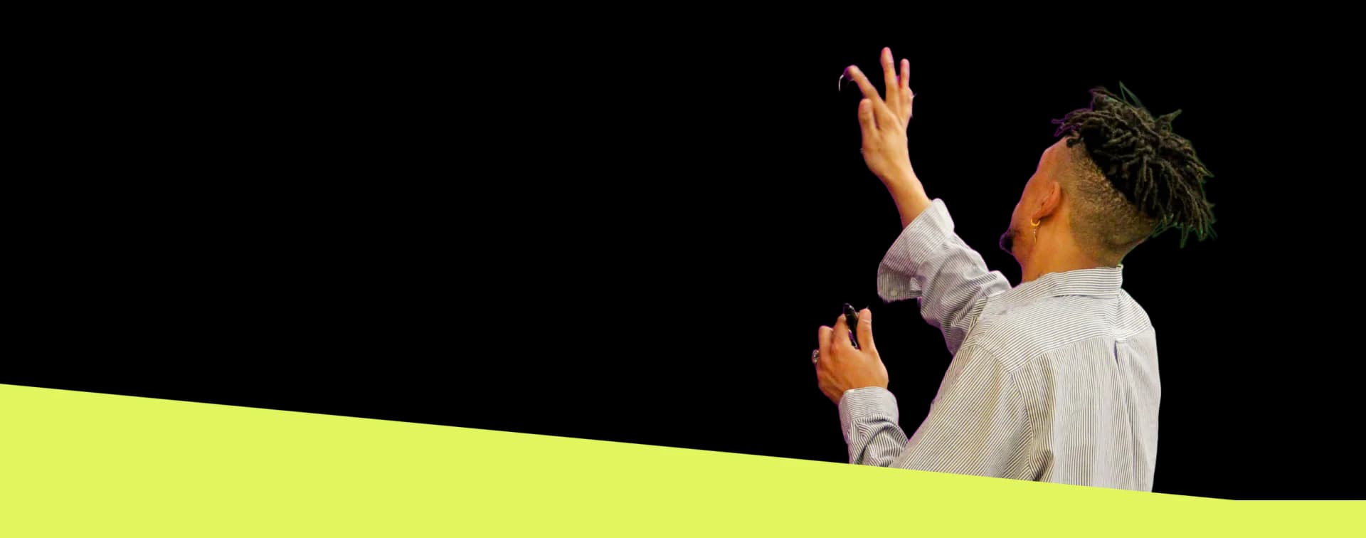 Person in white shirt with arms raised against white background, bisected by a bright lime-green horizontal band.