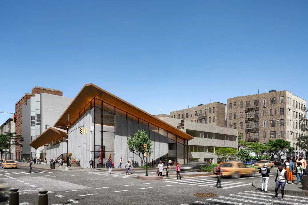 Exterior architectural rendering of a modern building with wooden overhang and glass frontage, situated on an urban street with neighboring historic apartment buildings.