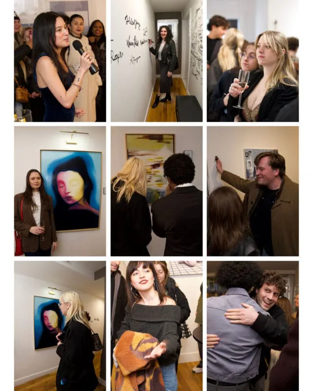 Gallery opening event with attendees viewing artwork and signing walls; colorful portraits visible on gallery walls.