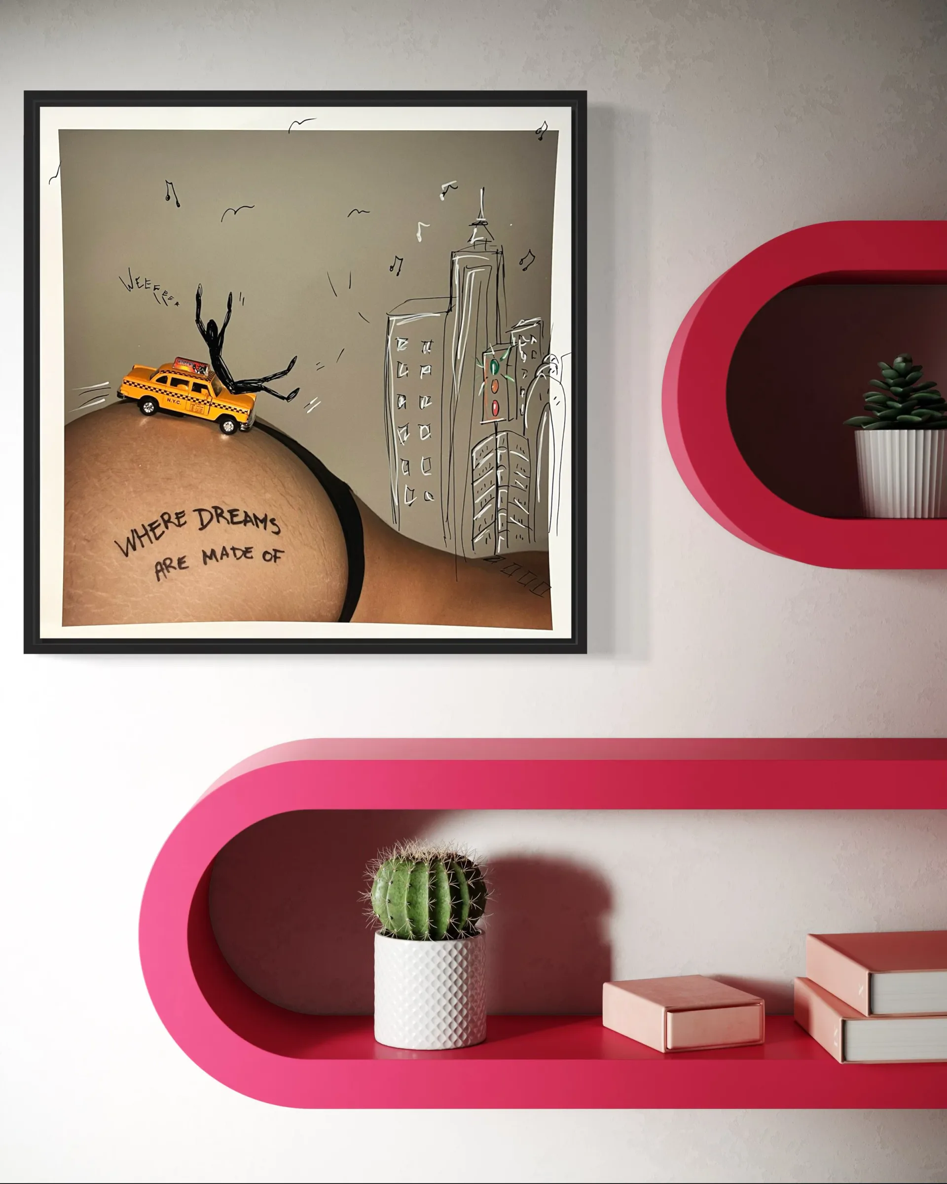 Gallery wall displaying a framed mixed-media artwork above neon-pink sculptural shelving holding a potted cactus and books.