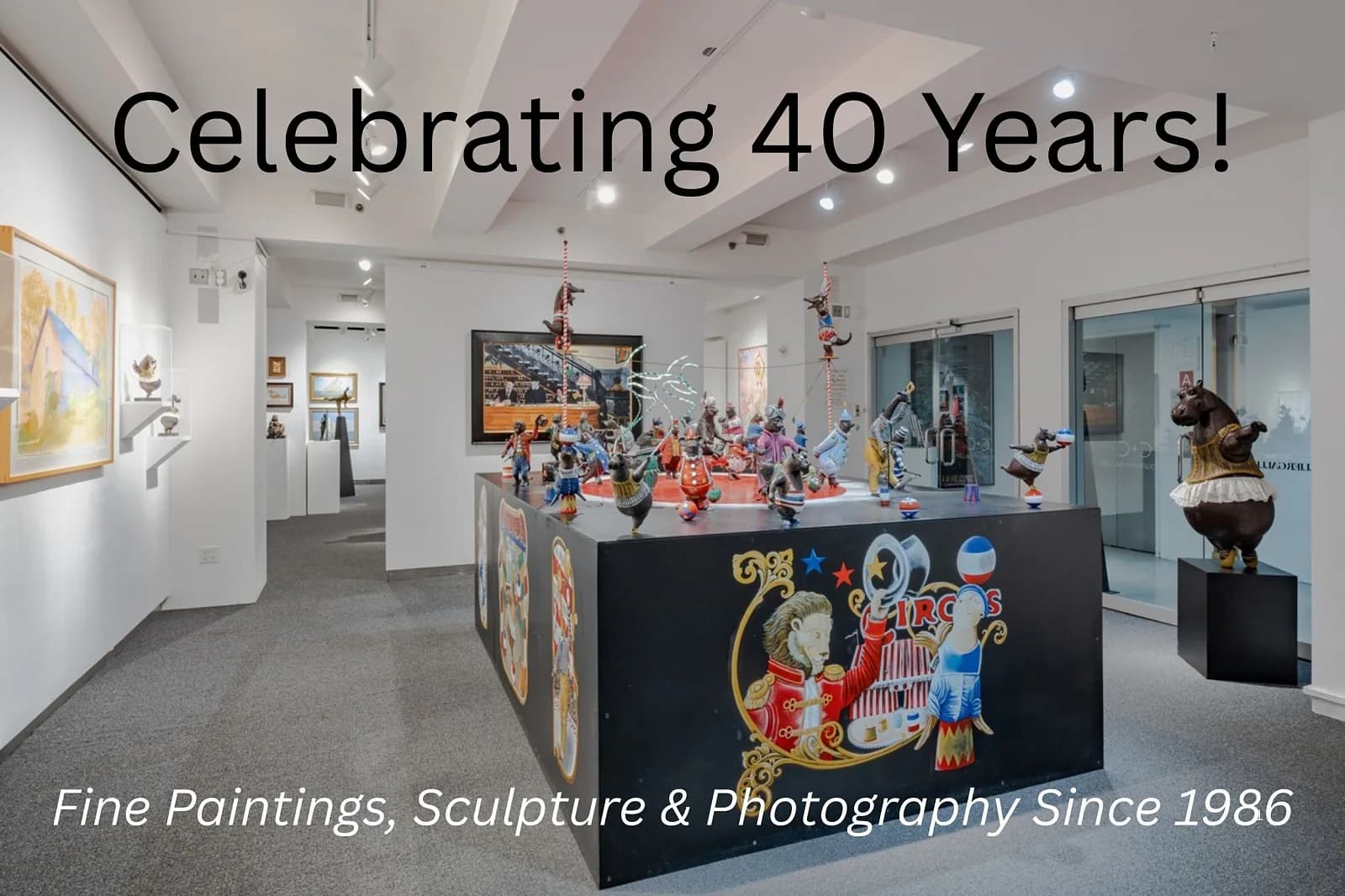 Cavalier Galleries interior with white walls displaying paintings and sculptures. Central black counter features colorful artwork. Text reads 'Celebrating 40 Years! Fine Paintings, Sculpture & Photography Since 1986.'