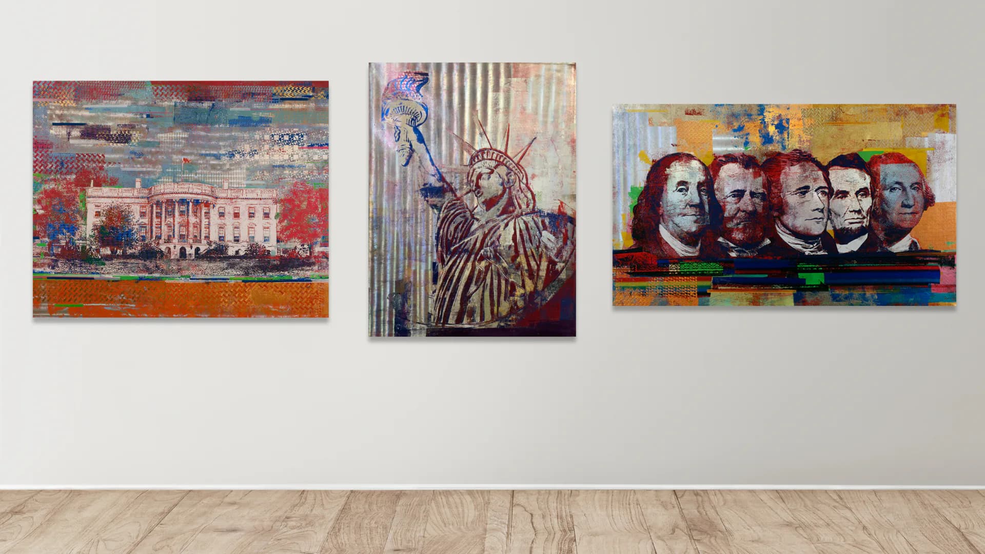 Three mixed-media paintings displayed on a white wall: White House with red and blue tones, Statue of Liberty in purple and gold, and five colorful portrait heads.