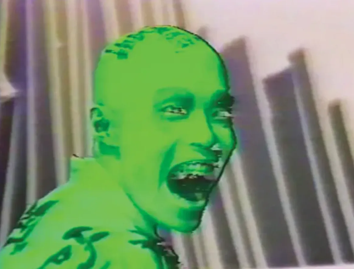Bright lime-green monochromatic portrait of a person's face with exaggerated expression against blurred vertical striped background.
