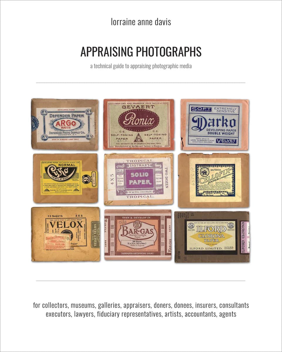 Book cover for 'Appraising Photographs' by Lorraine Anne Davis, displaying vintage photography paper package labels in a 3x3 grid layout.