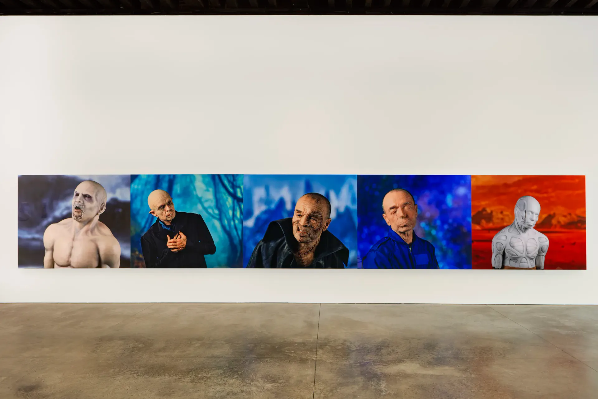Horizontal photographic series showing five portraits of the same man against increasingly vivid blue, orange, and red backgrounds.