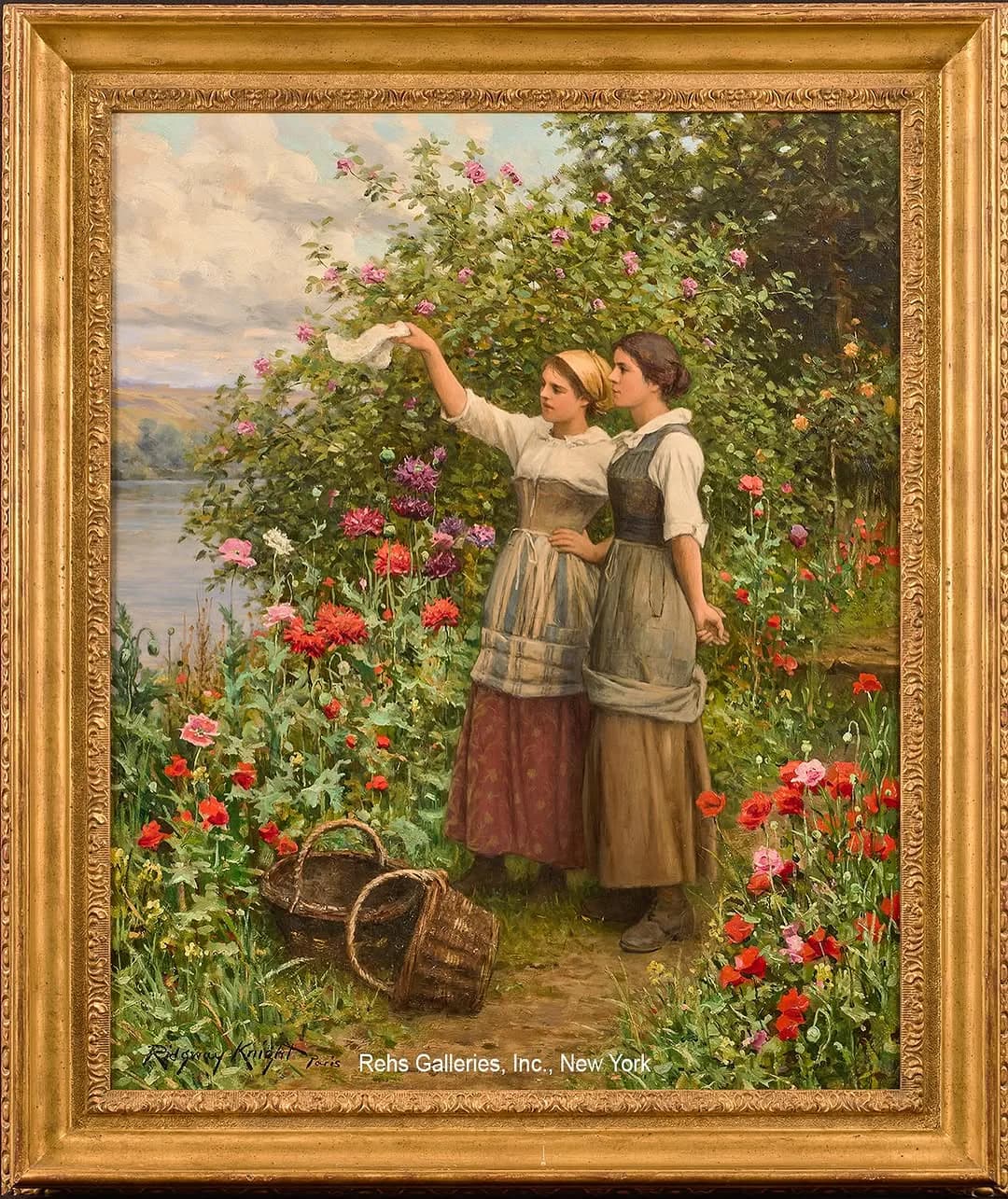 Oil painting in gilt frame depicting two young women picking roses in lush riverside garden with landscape background, 19th-century academic style. Rehs Galleries.