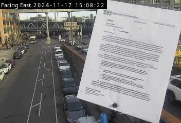 Split-screen image showing a street view timestamp and an official letter document displayed against an urban backdrop.