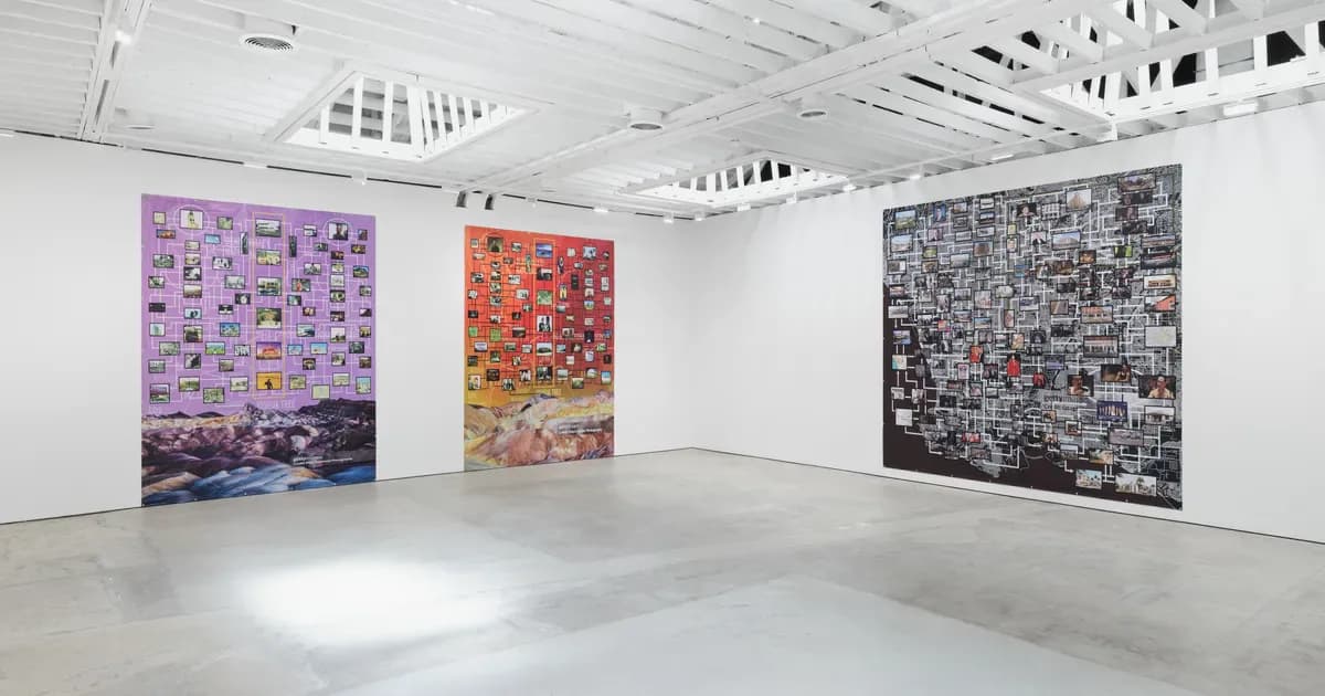 Gallery interior with three large colorful works on walls—purple, orange-red, and grayscale—displayed in white minimalist exhibition space with polished concrete floor.