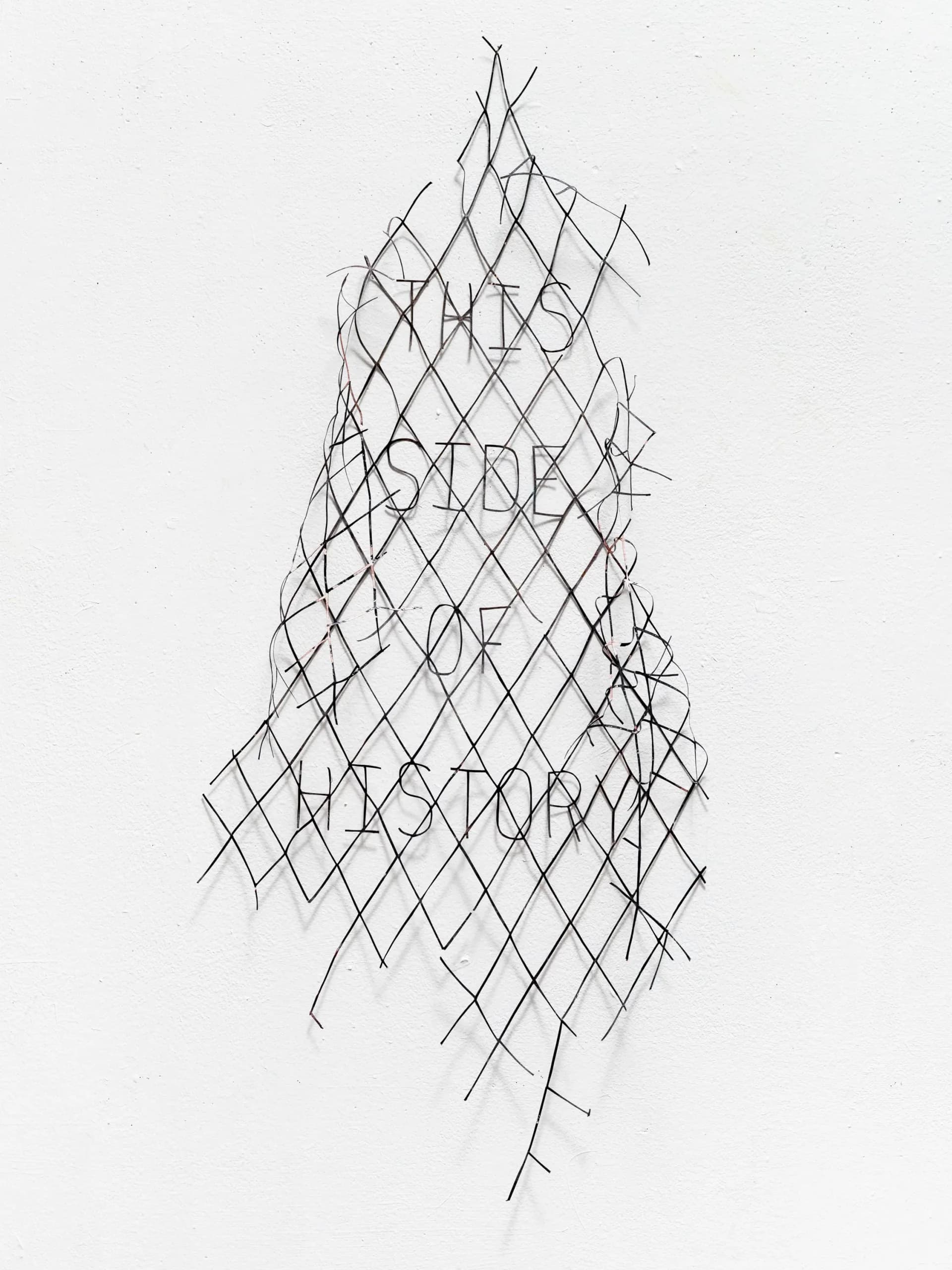 Pencil drawing of an abstract geometric form with intersecting diamond shapes tapering downward, creating a three-dimensional latticed structure.