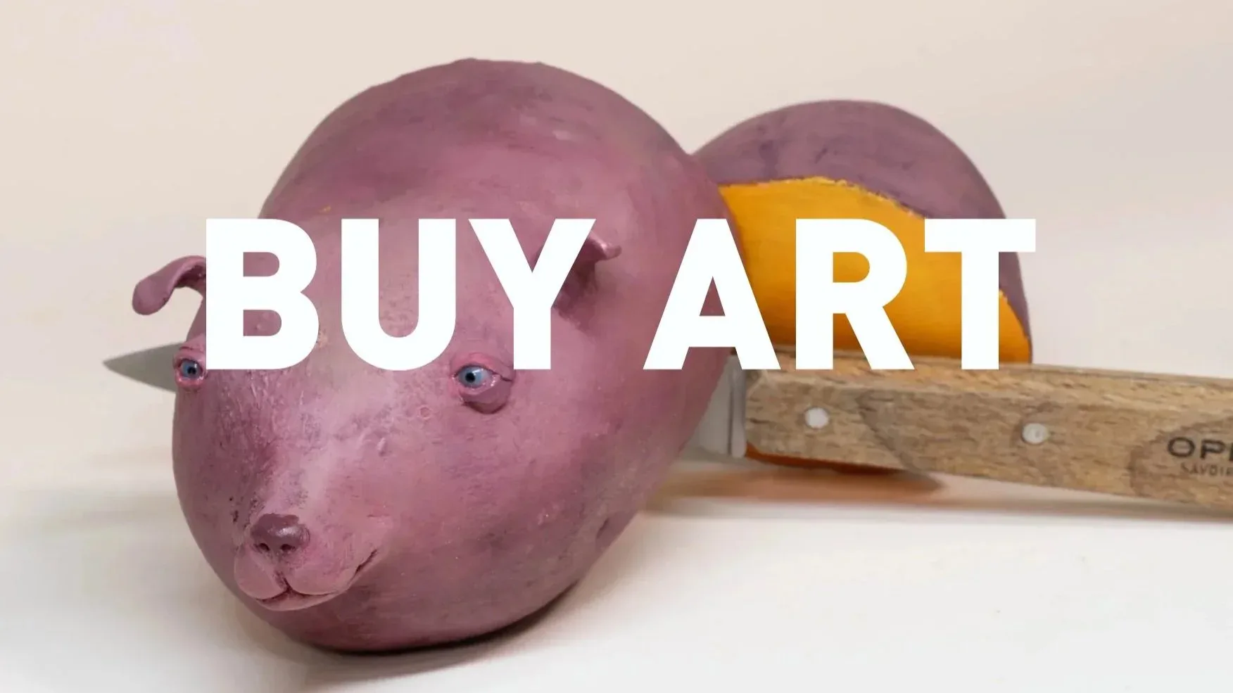 Sculptural artwork of a purple ceramic dog head mounted on a wooden handle, with white text overlay reading 'BUY ART'.