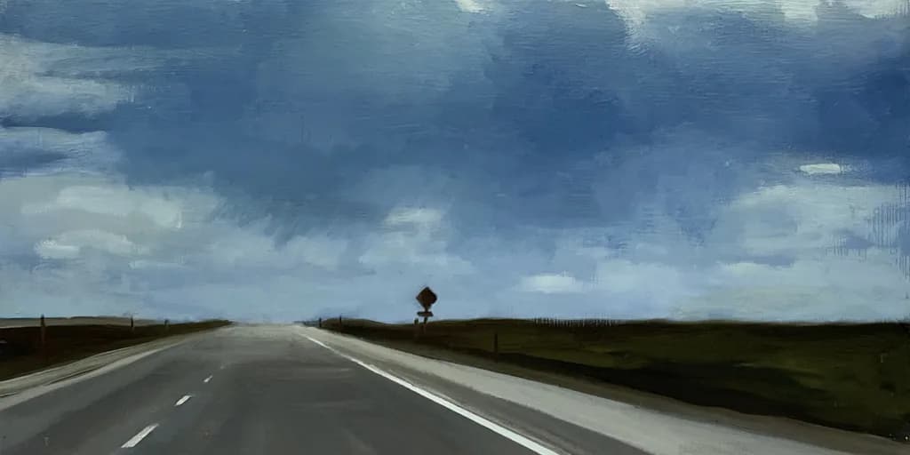 Photograph of a straight highway stretching toward horizon under dramatic cloudy sky, with solitary tree in distance and flat grassland on either side.